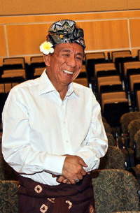 smiling photo of Eddy Nugroho Sandjaja in dance costume